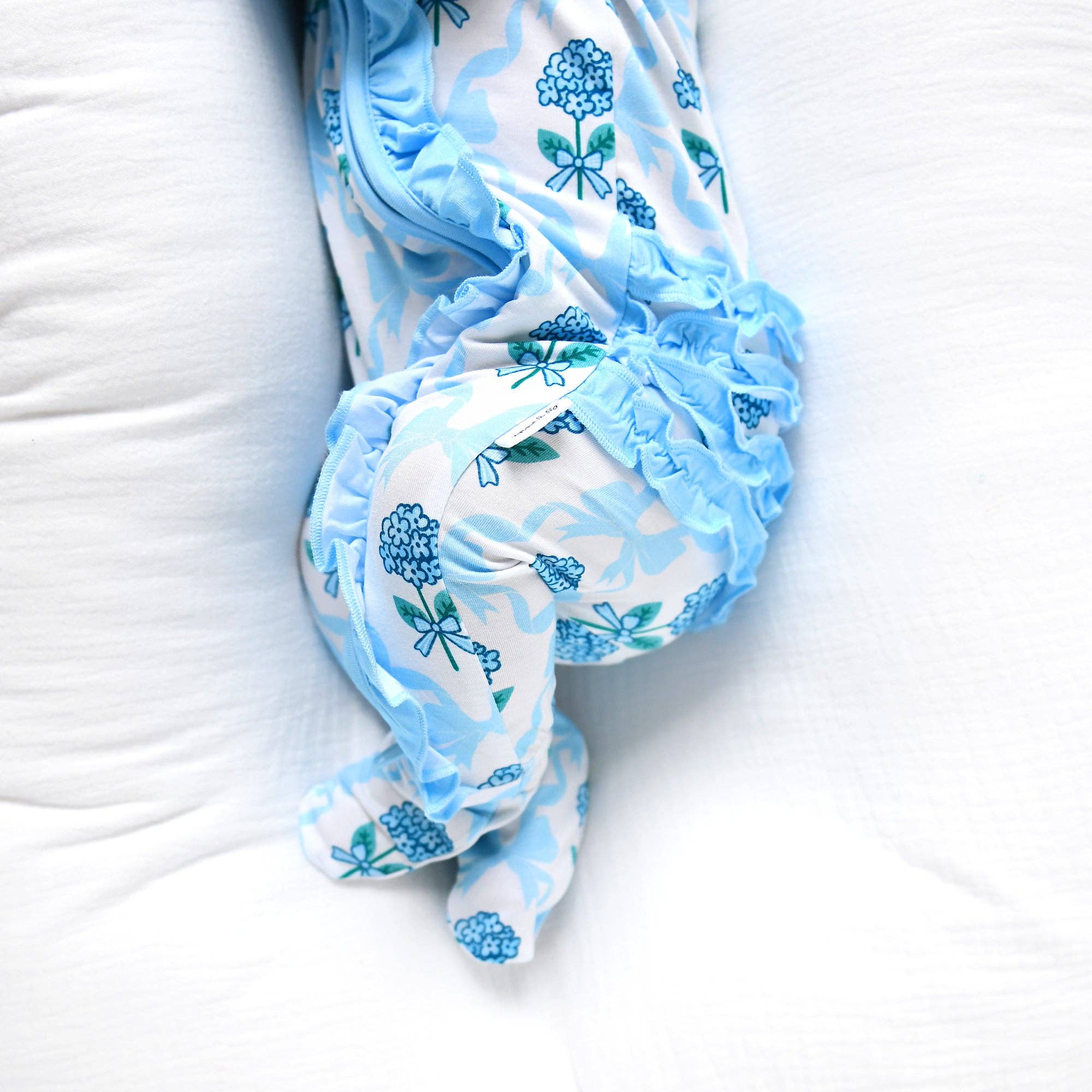 Bamboo Floral Ruffle Zip Sleeper — Baby One-Piece Outfit