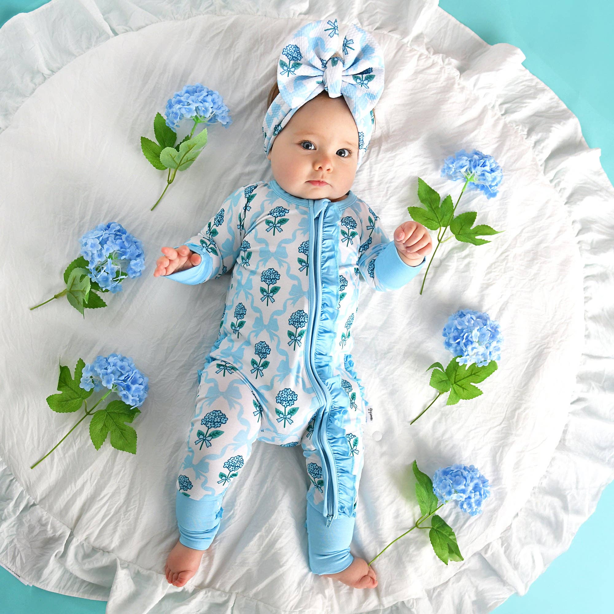 Bamboo Floral Ruffle Zip Sleeper — Baby One-Piece Outfit