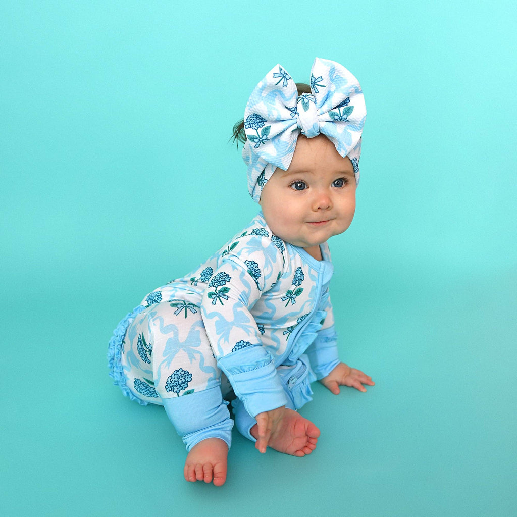 Bamboo Floral Ruffle Zip Sleeper — Baby One-Piece Outfit