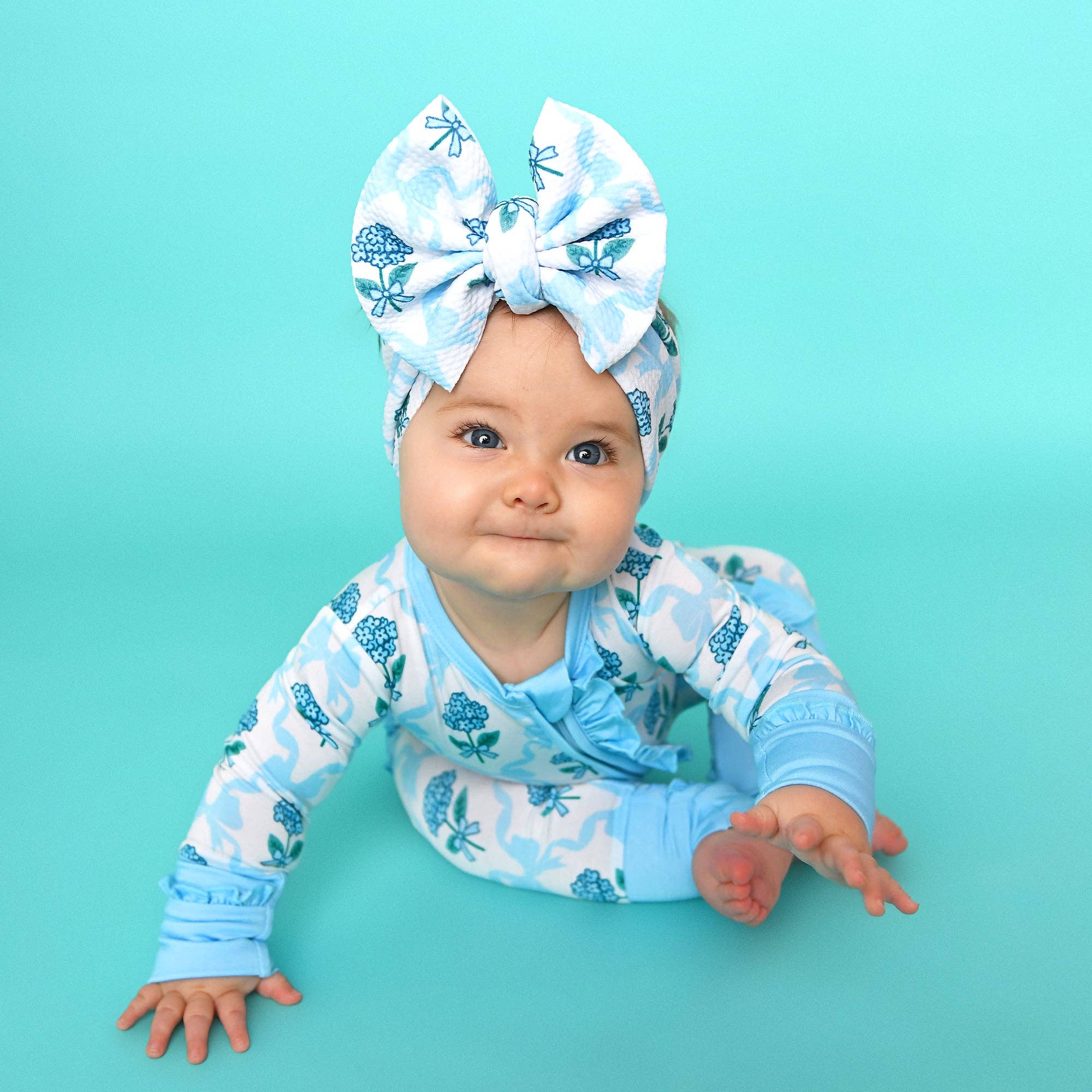 Bamboo Floral Ruffle Zip Sleeper — Baby One-Piece Outfit