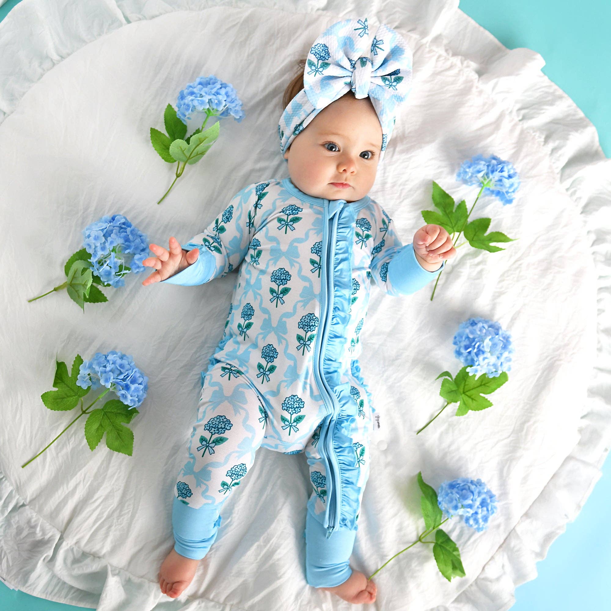 Bamboo Floral Ruffle Zip Sleeper — Baby One-Piece Outfit