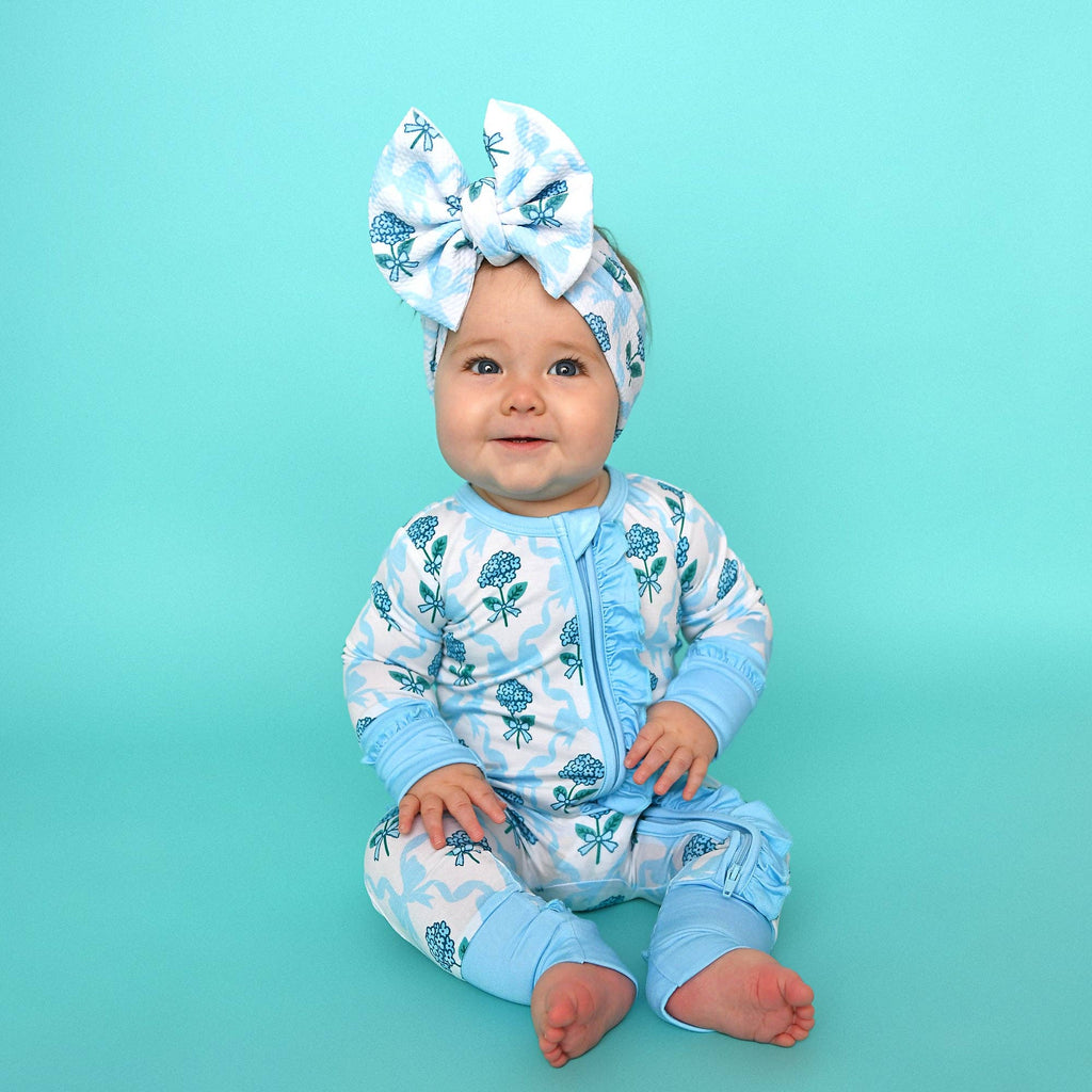Bamboo Floral Ruffle Zip Sleeper — Baby One-Piece Outfit