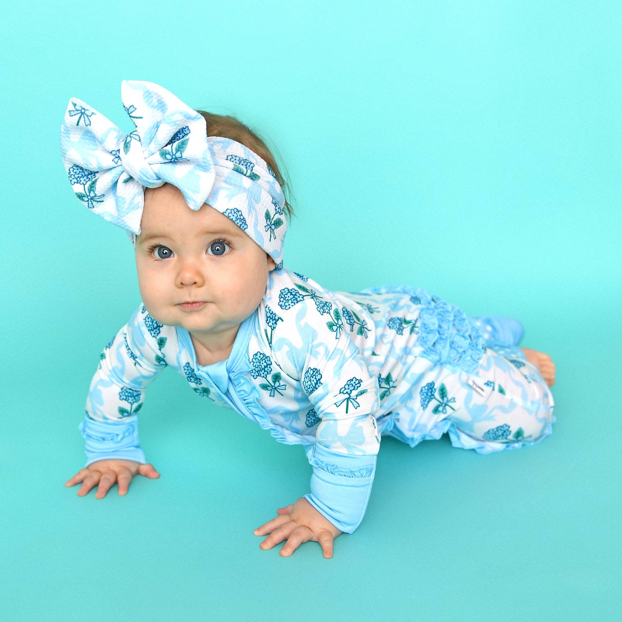Bamboo Floral Ruffle Zip Sleeper — Baby One-Piece Outfit